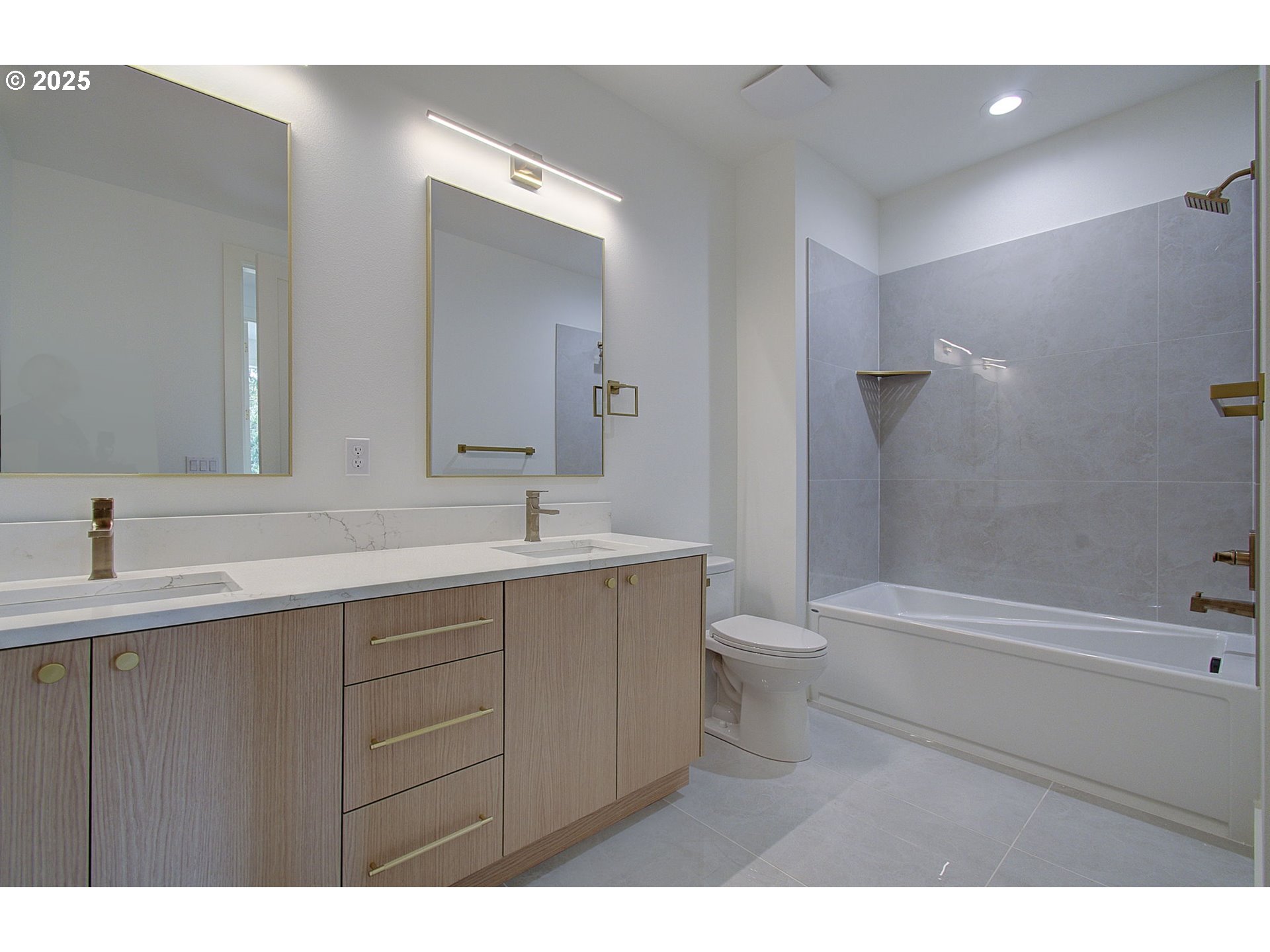2012 Northeast 159th Street Ridgefield, WA 98642 - Photo 31 of 47 a bathroom with a double vanity sink toilet and shower