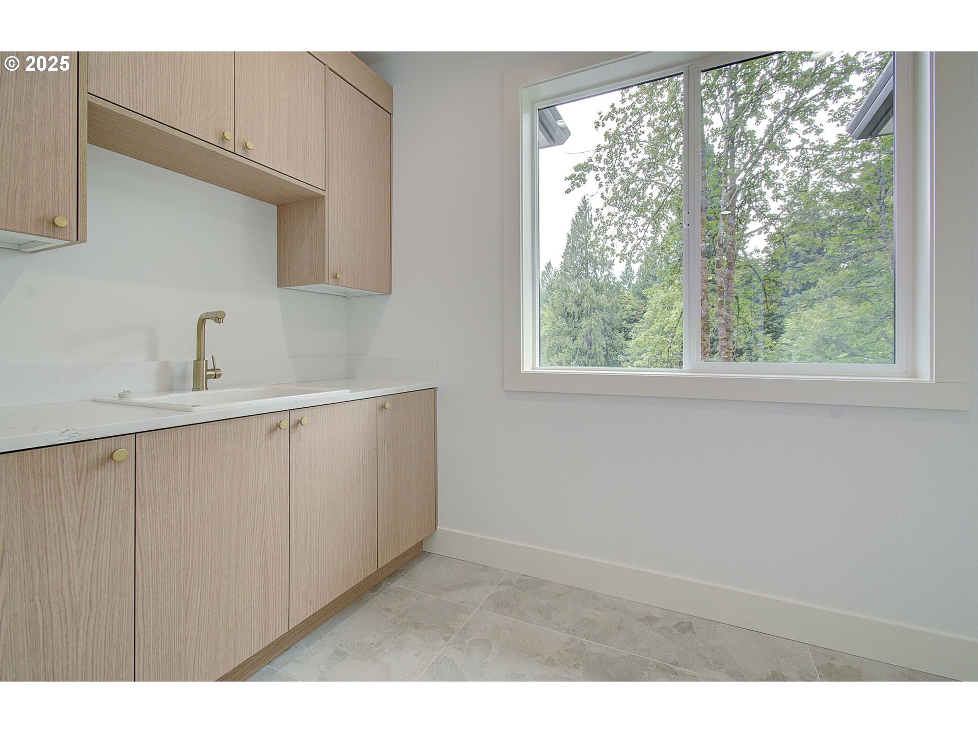 2012 Northeast 159th Street Ridgefield, WA 98642 - Photo 33 of 47 a kitchen with a sink and large window