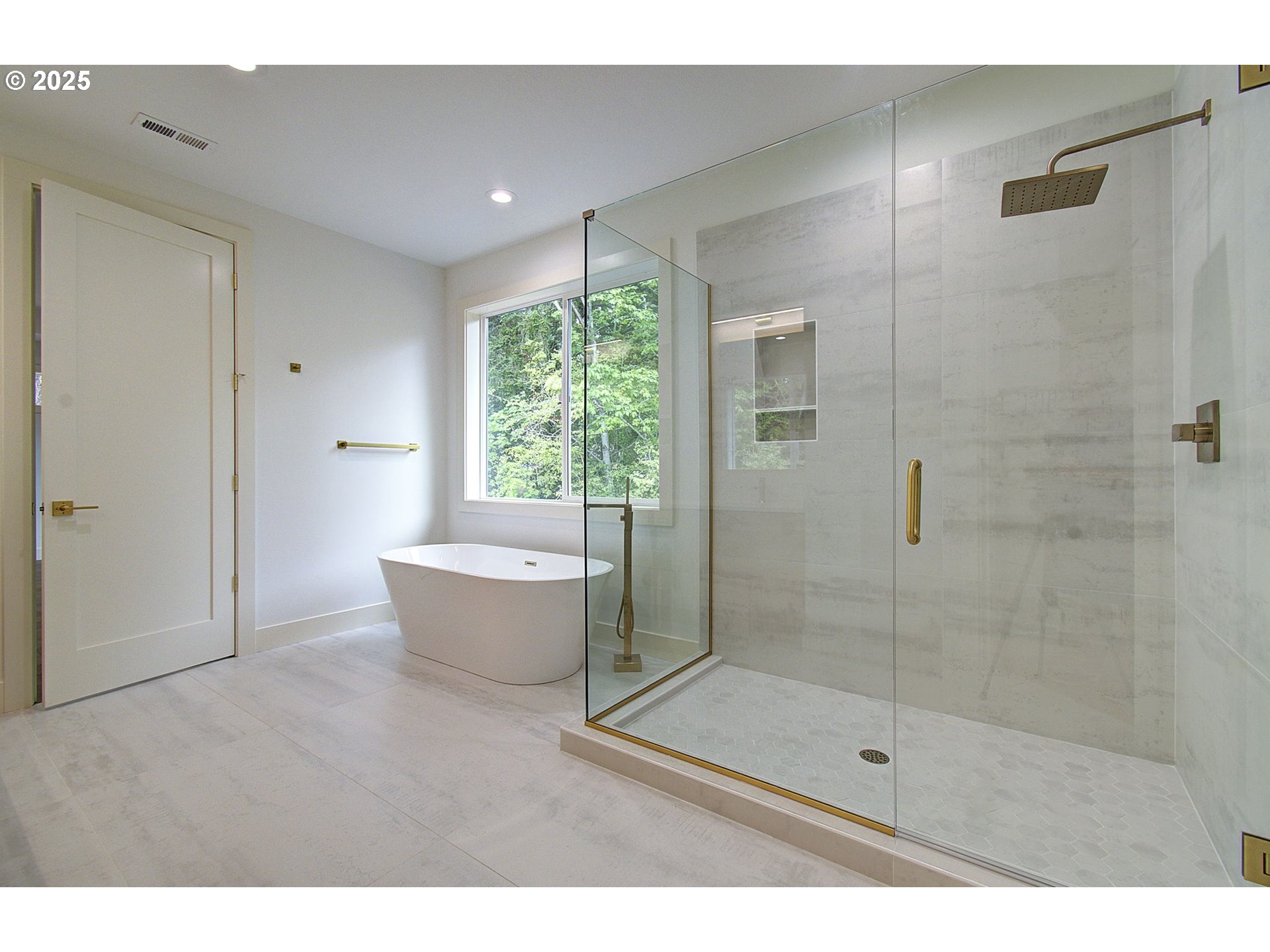 2012 Northeast 159th Street Ridgefield, WA 98642 - Photo 36 of 47 a bathroom with a bathtub and shower