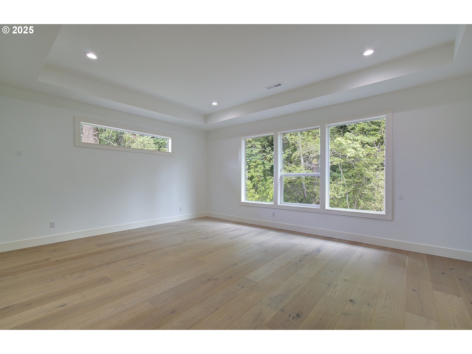 2012 Northeast 159th Street Ridgefield, WA 98642 - Photo 40 of 47 a view of an empty room with wooden floor and a window