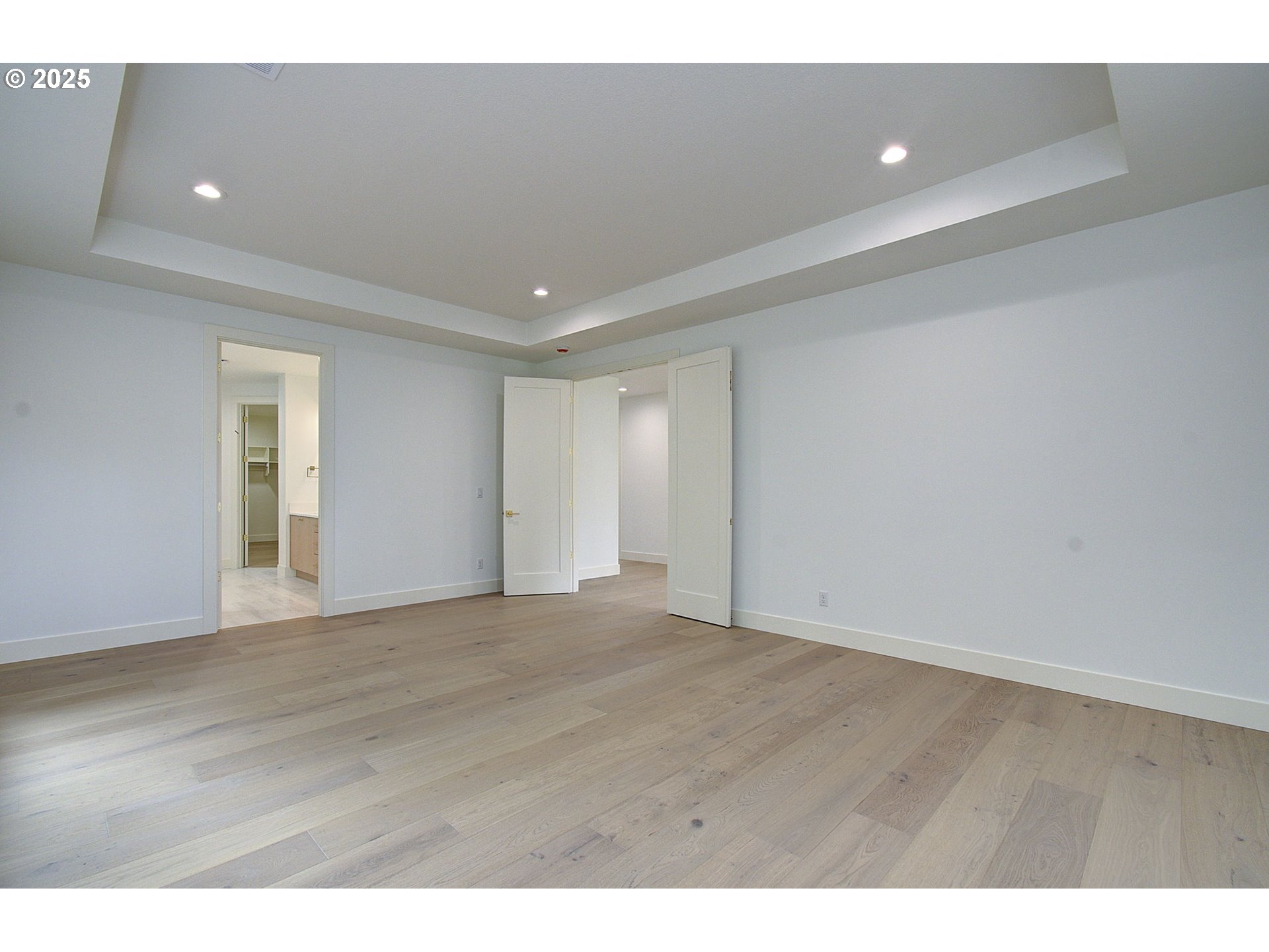 2012 Northeast 159th Street Ridgefield, WA 98642 - Photo 41 of 47 a view of an empty room with wooden floor