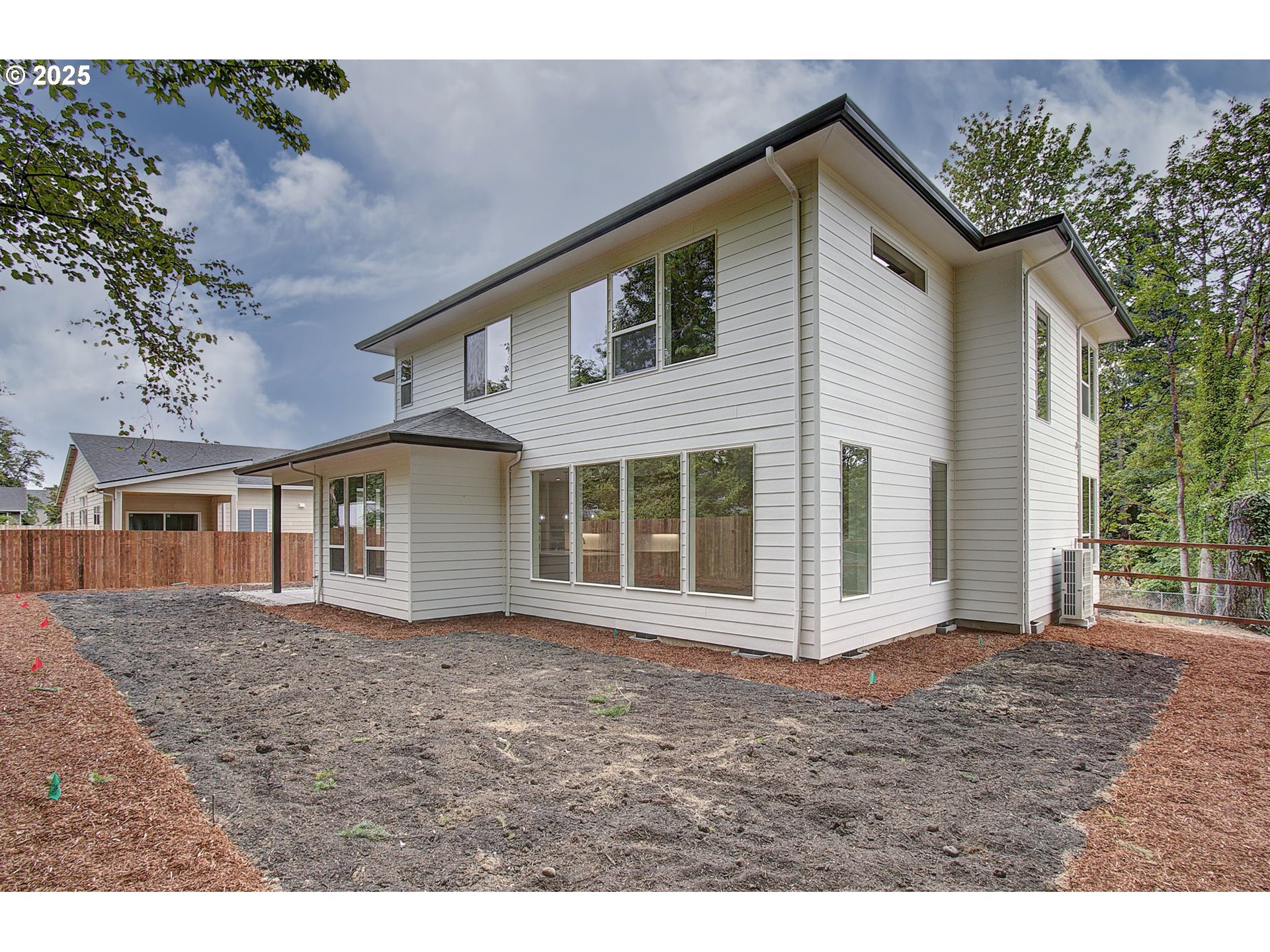 2012 Northeast 159th Street Ridgefield, WA 98642 - Photo 43 of 47 a front view of a house with a garden
