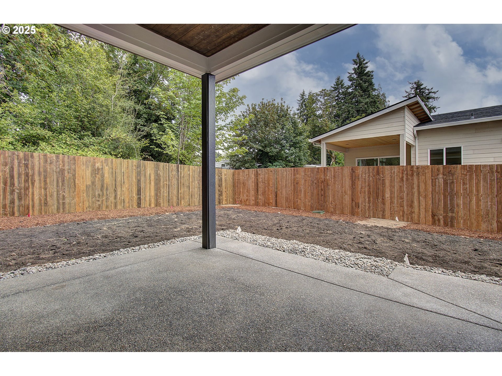2012 Northeast 159th Street Ridgefield, WA 98642 - Photo 46 of 47 a view of a backyard with wooden fence