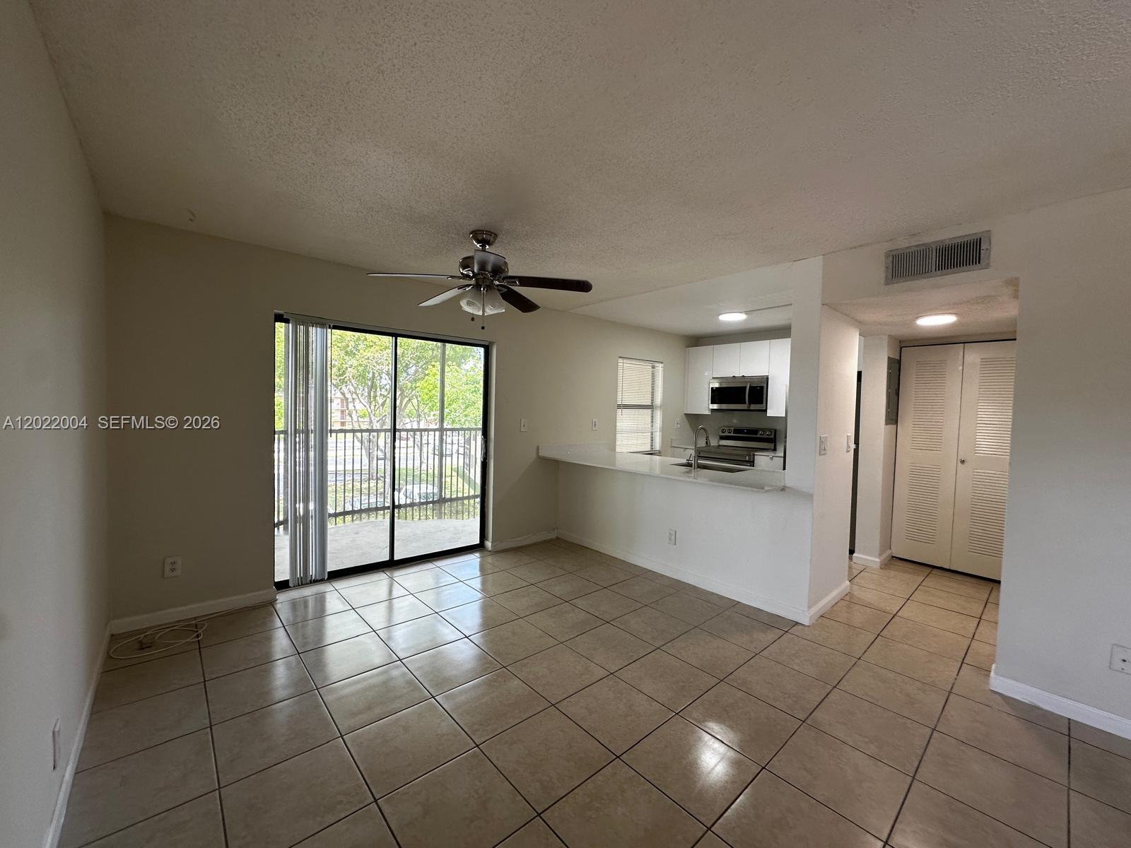 3400 Foxcroft Road, Unit 301 Miramar, FL 33025 - Photo 11 of 72 a view of large windows in a kitchen