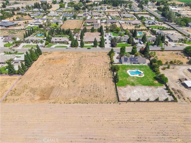 a view of open space with yard