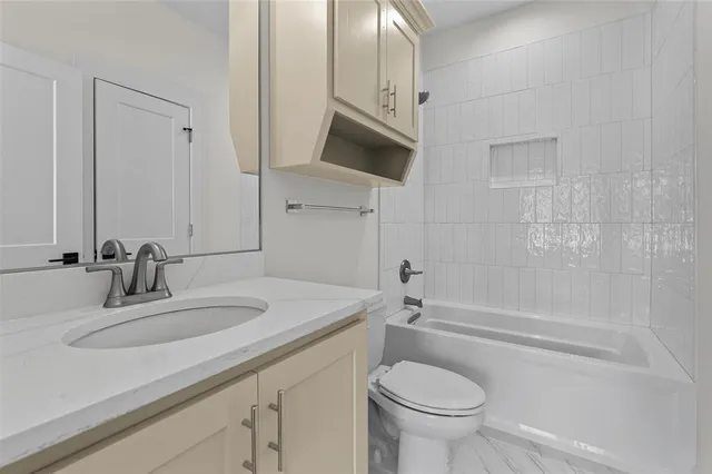 an empty room with wooden floor