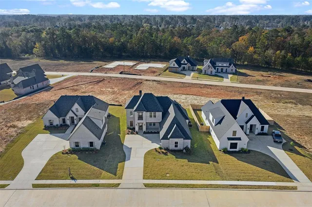 a view of swimming pool with seating space