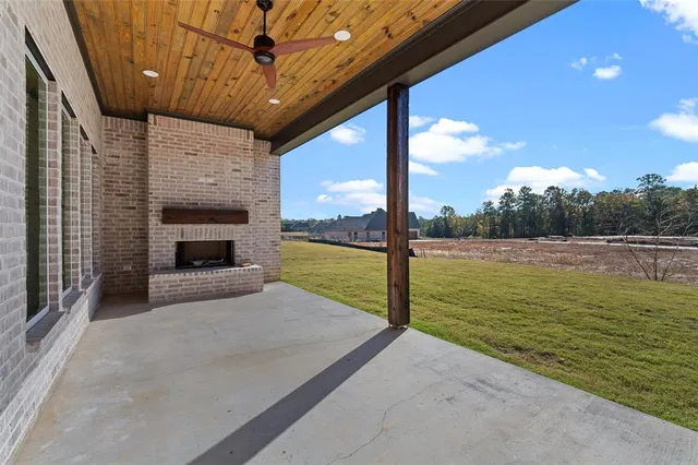 a view of a living room and a fireplace