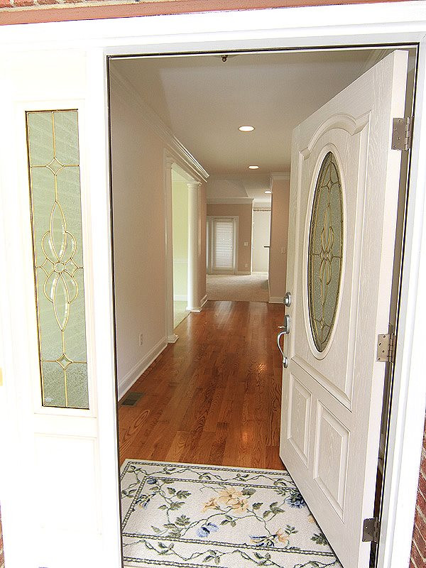 11612 Midlavian Drive Raleigh, NC 27614 - Photo 2 of 25 The entry foyer has hardwood floors and an extra large hall closet Entry Hall