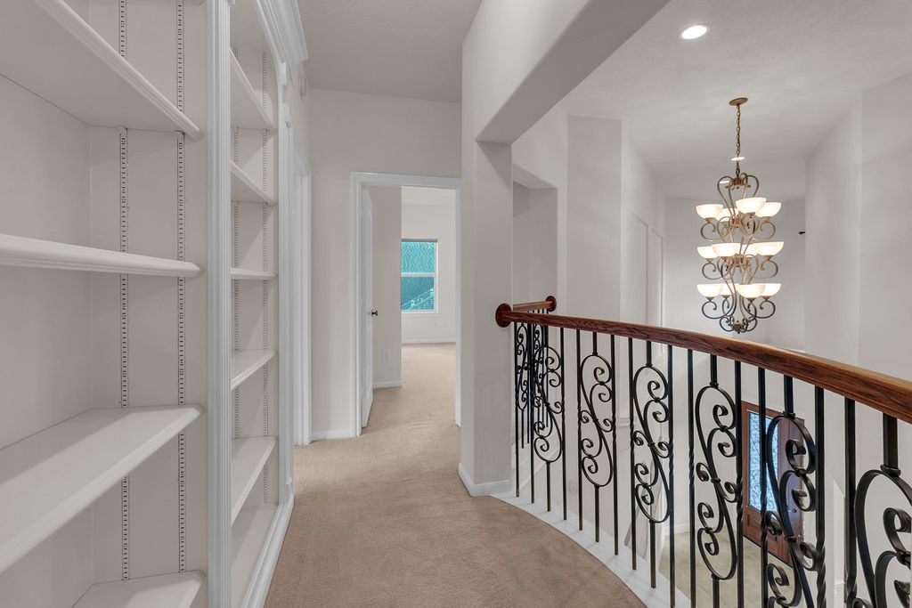 7306 Starflower Katy, TX 77494 - Photo 41 of 50 a view of a hallway with windows