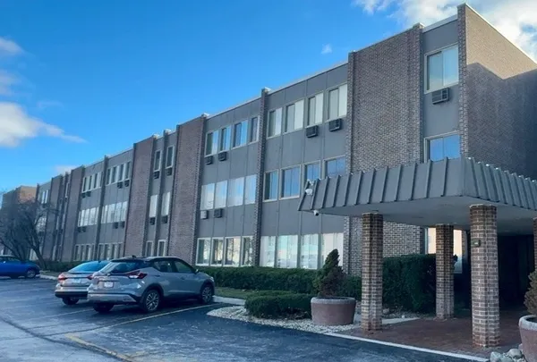a car parked in front of a building