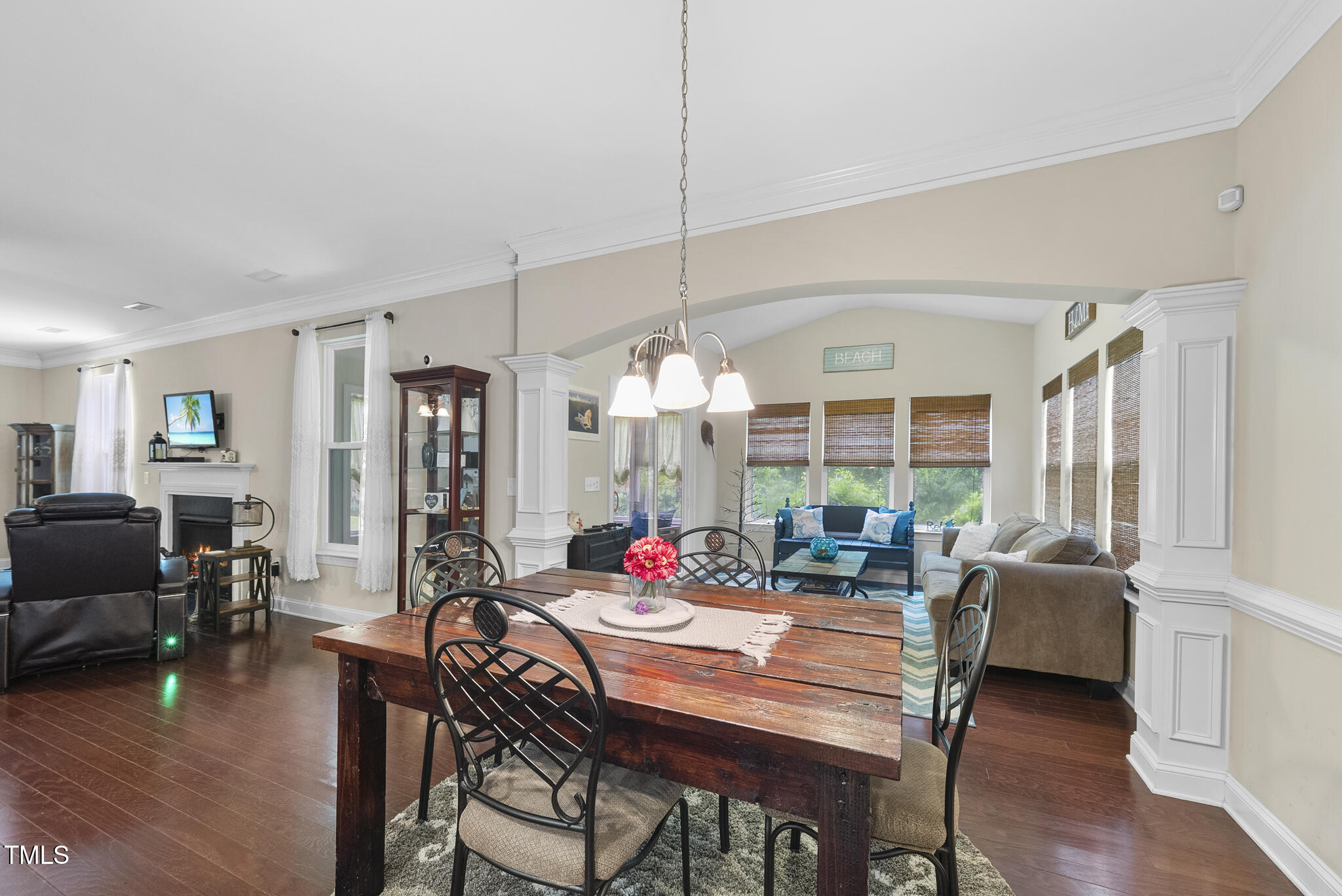 728 Spruce Meadows Lane Willow Spring, NC 27592 - Photo 13 of 45 a view of a dining room with furniture window and wooden floor