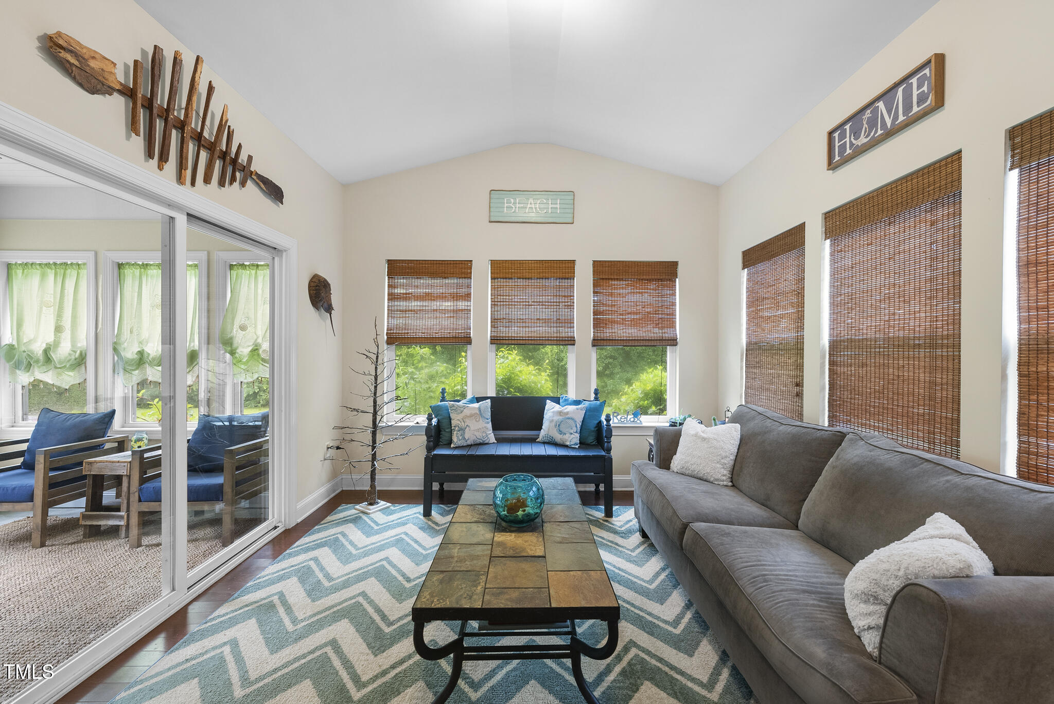 728 Spruce Meadows Lane Willow Spring, NC 27592 - Photo 16 of 45 a living room with furniture and a large window