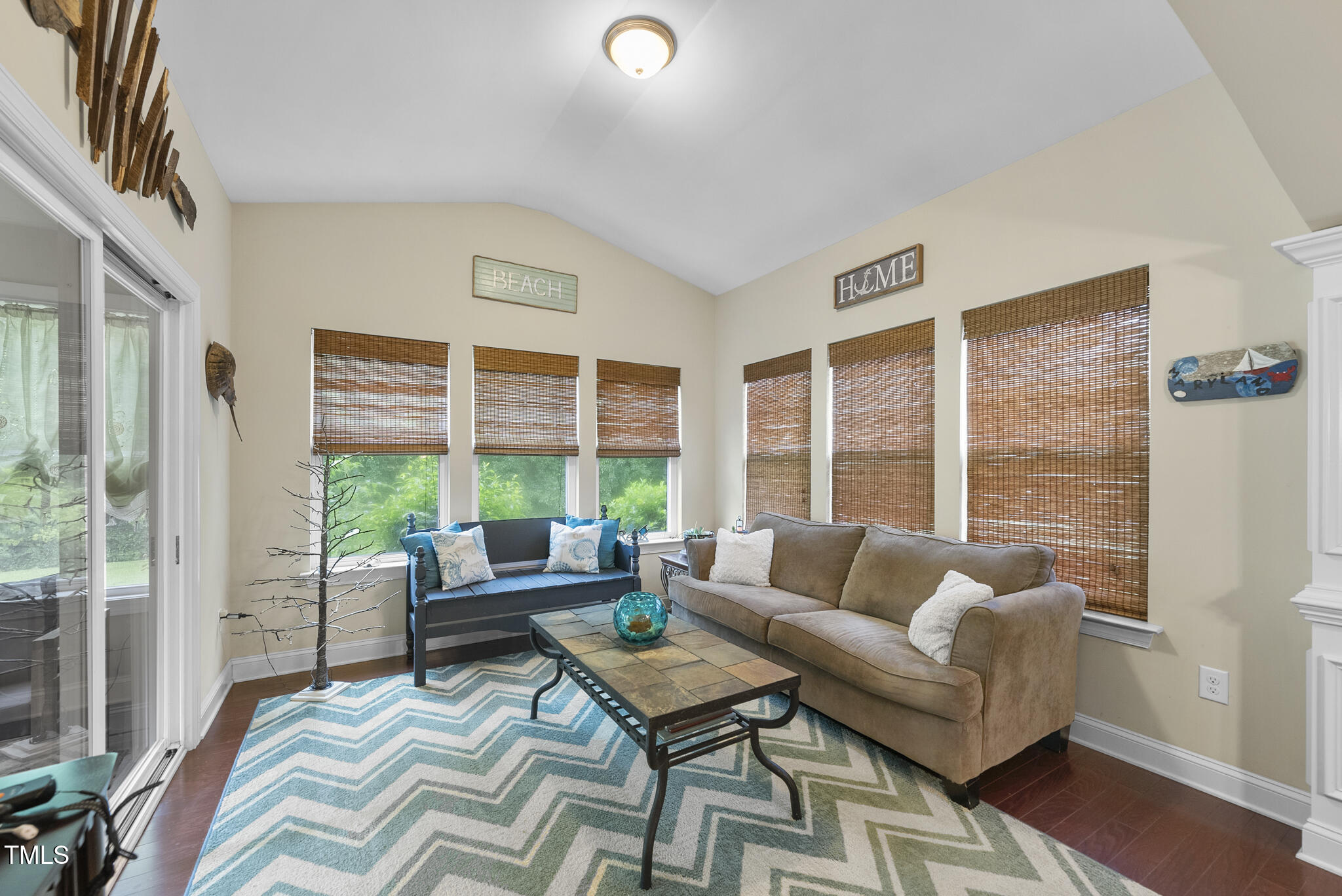 728 Spruce Meadows Lane Willow Spring, NC 27592 - Photo 17 of 45 a living room with furniture and a large window
