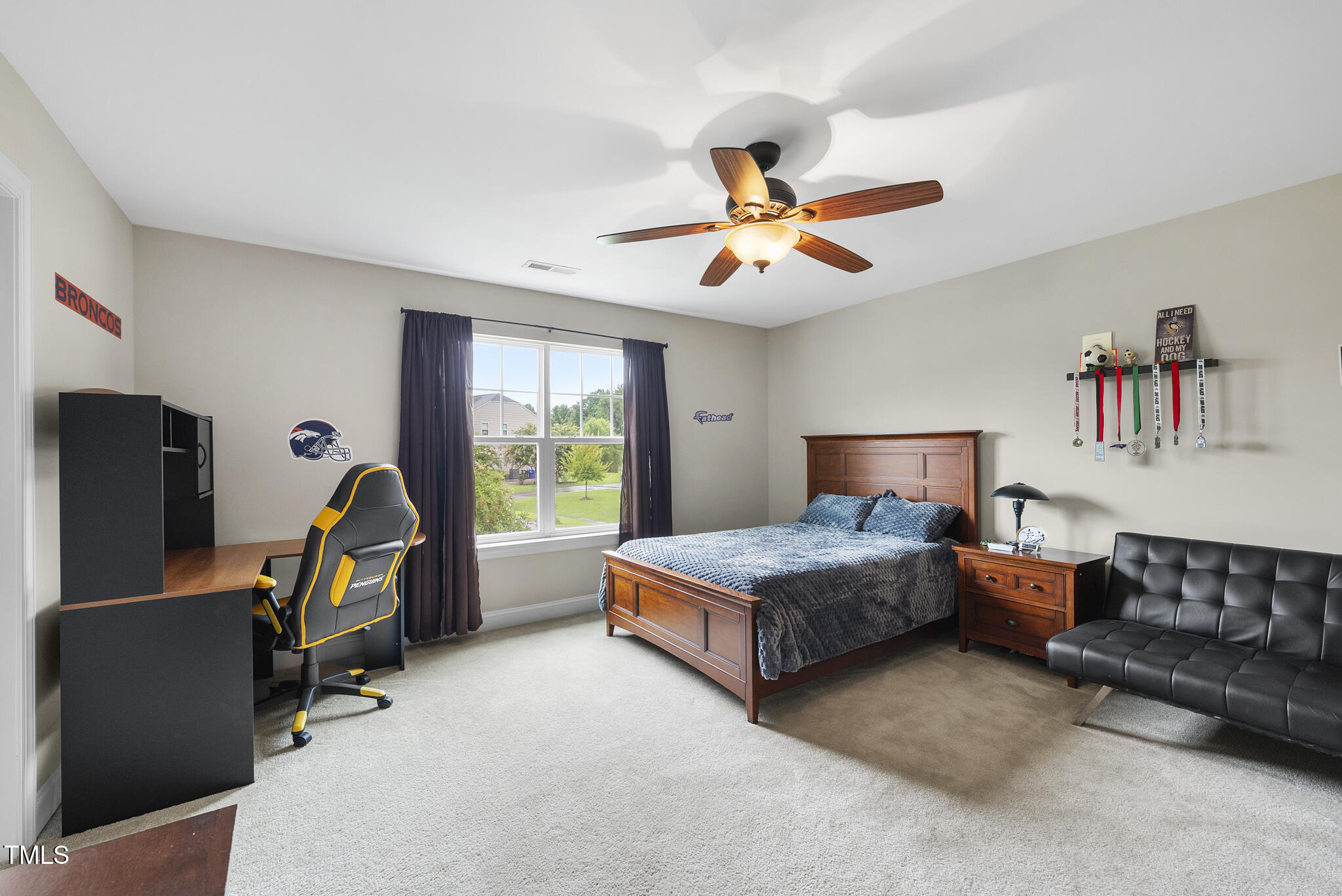 728 Spruce Meadows Lane Willow Spring, NC 27592 - Photo 29 of 45 a bedroom with furniture and a gym equipment
