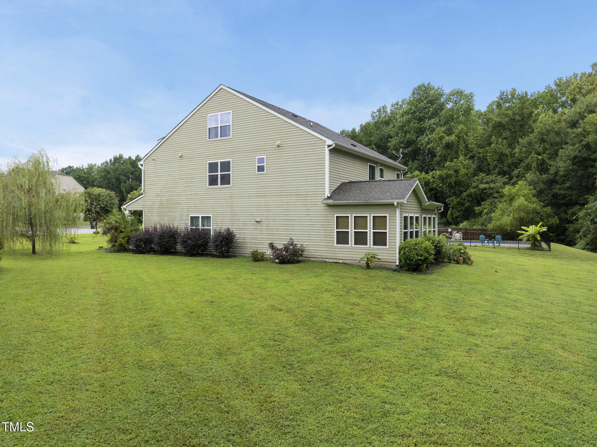 728 Spruce Meadows Lane Willow Spring, NC 27592 - Photo 34 of 45 a view of a backyard of the house