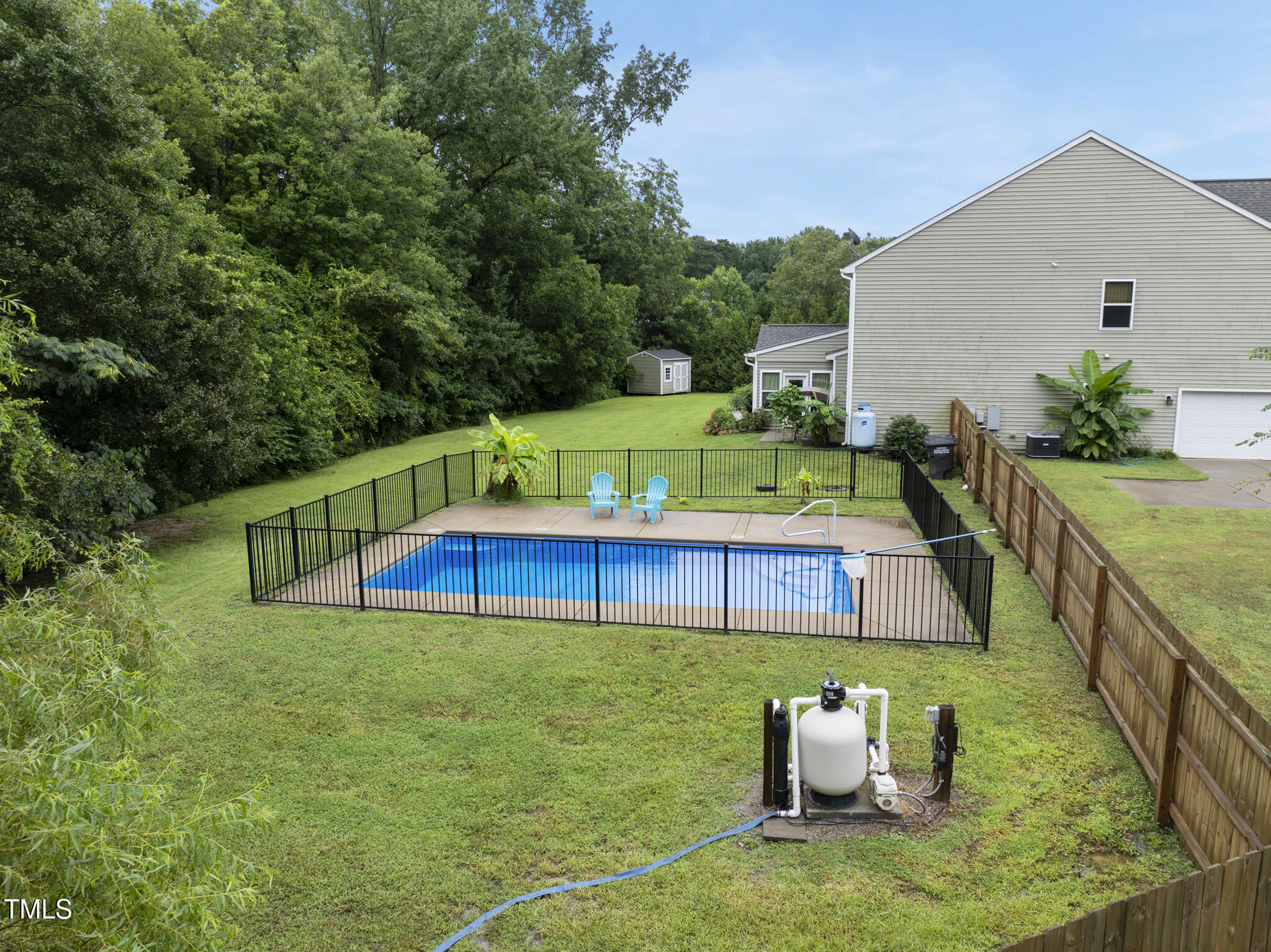 728 Spruce Meadows Lane Willow Spring, NC 27592 - Photo 37 of 45 a balcony with table and chairs