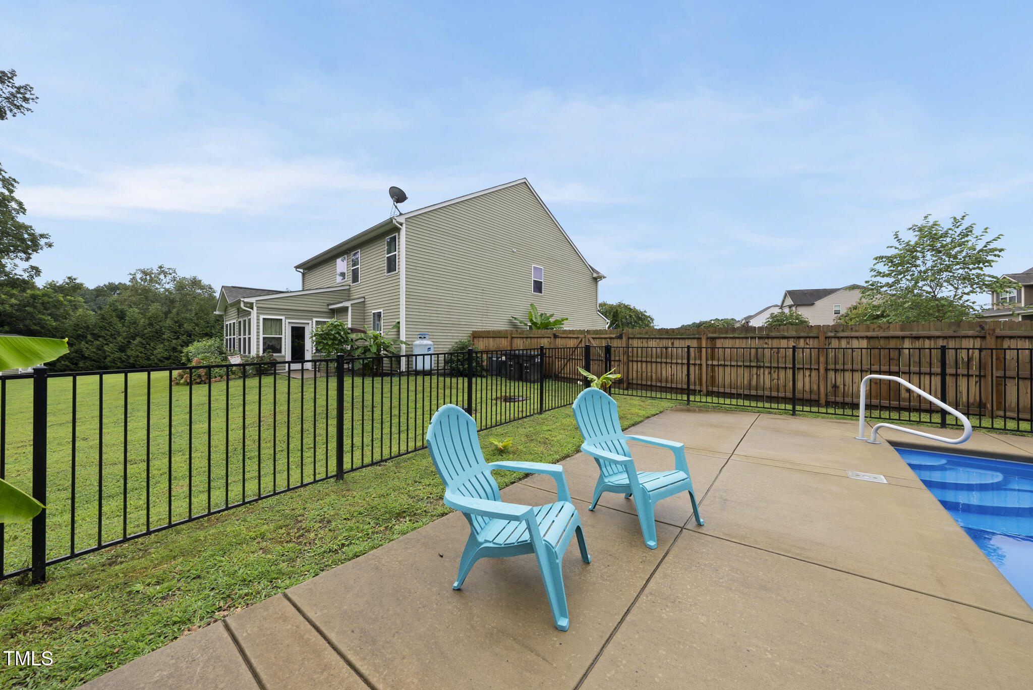 728 Spruce Meadows Lane Willow Spring, NC 27592 - Photo 43 of 45 a view of backyard with seating area and green space