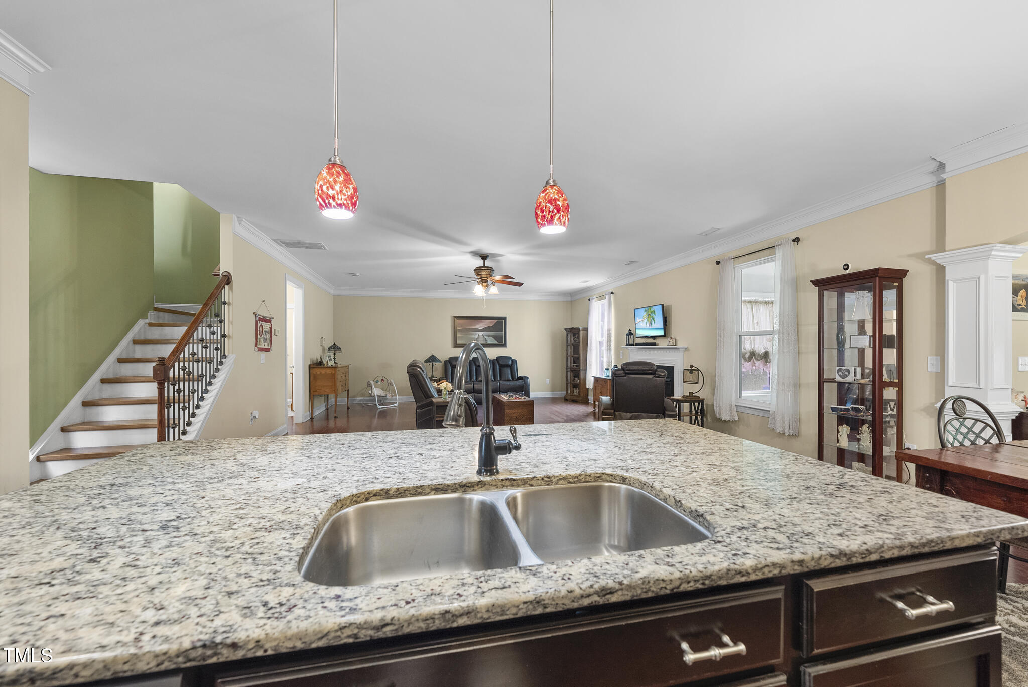 728 Spruce Meadows Lane Willow Spring, NC 27592 - Photo 7 of 45 a kitchen with a sink and a mirror