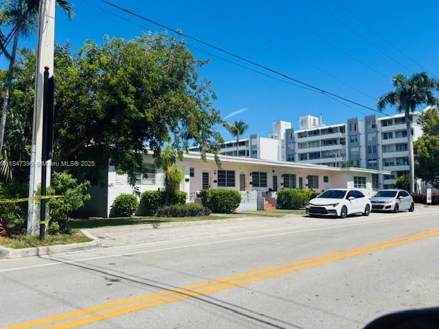 1085 94th Street, Unit 9407 Bay Harbor Islands, FL 33154 - Photo 2 of 6 a car parked on the side of the road