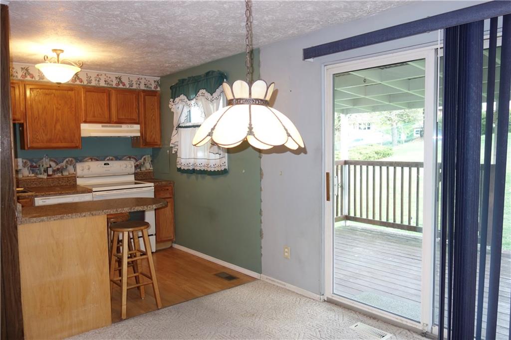 120 Wren Way Washington, PA 15301 - Photo 11 of 30 a kitchen view with a table and chairs in it