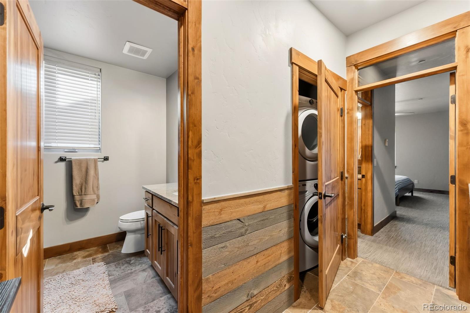 481 West Main Street, Unit B201 Frisco, CO 80443 - Photo 15 of 26 a bathroom with a tub and a shower