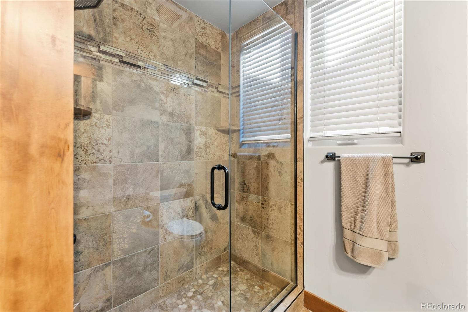 481 West Main Street, Unit B201 Frisco, CO 80443 - Photo 17 of 26 a bathroom with a shower