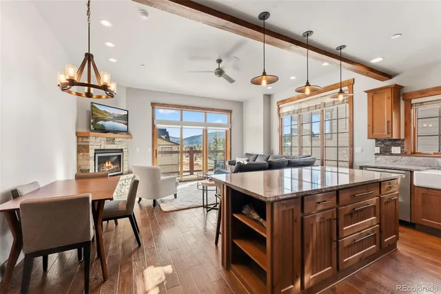 a kitchen with a stove and a refrigerator