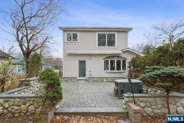 135 7th Street Cresskill, NJ 07626 - Photo 16 of 17 a front view of a house with garden