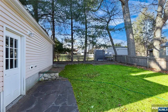 a view of a backyard with a garden
