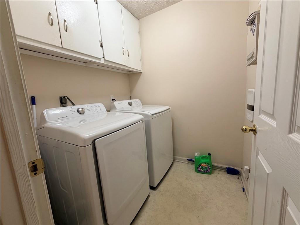 426 Pates Lake Court Hampton, GA 30228 - Photo 51 of 60 a utility room with dryer and washer