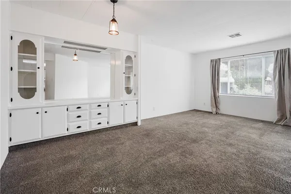 a view of an empty room with window