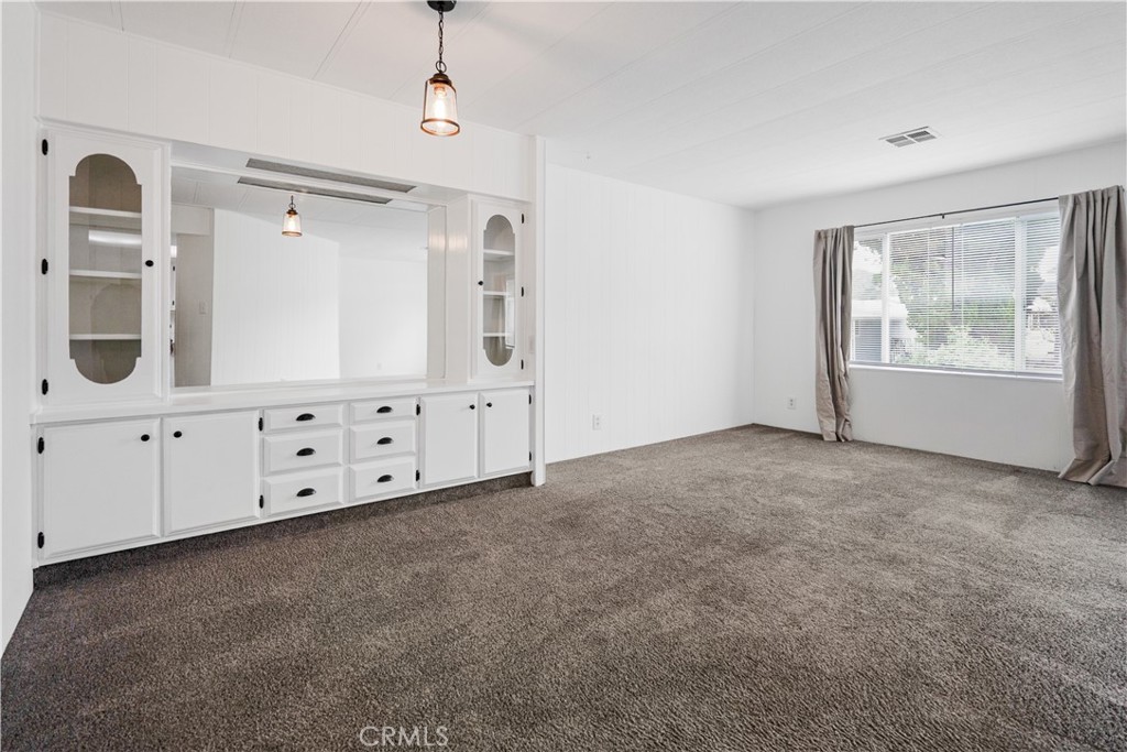 6480 Katherine, Unit 62 Simi Valley, CA 93063 - Photo 7 of 22 a view of an empty room with window