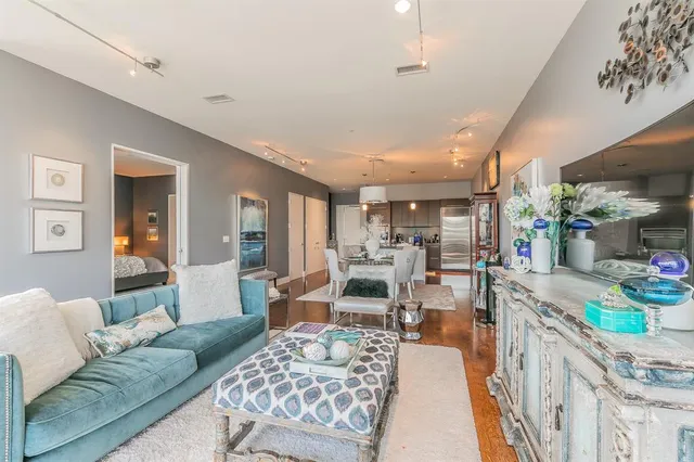 a living room with furniture and a table