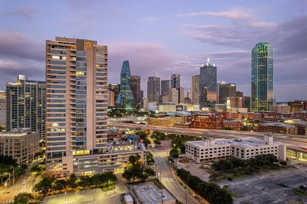 a view of a city with tall buildings