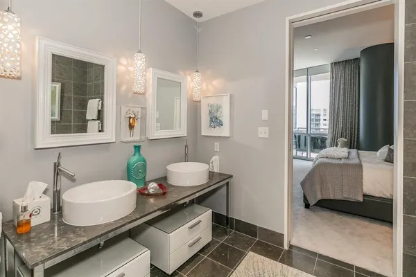 a bathroom with a bathtub and a shower
