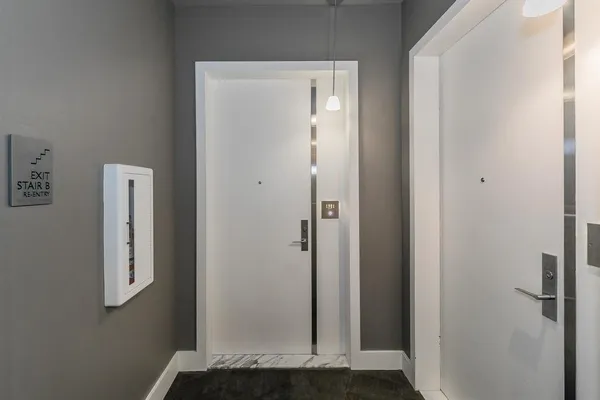 a view of room with a sink and mirror