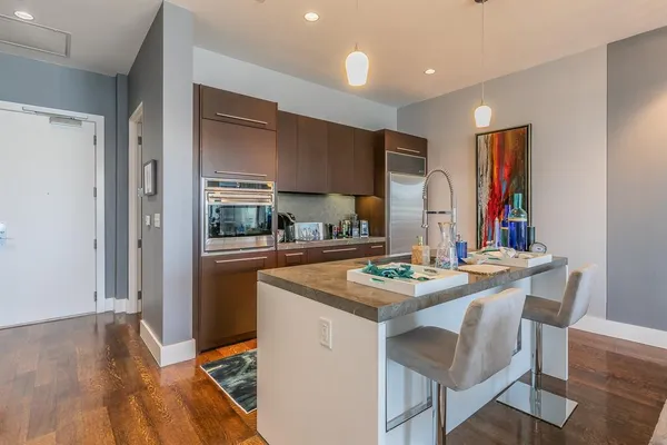 a view of living room and kitchen