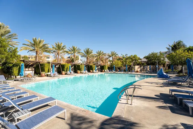 a view of a swimming pool with a patio