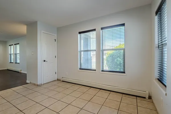 a view of an empty room with window