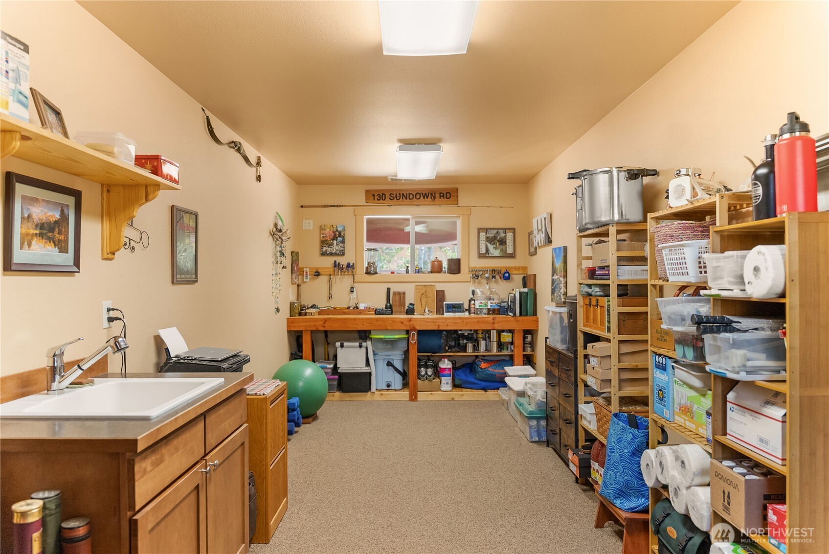 130 Sundown Road Winthrop, WA 98862 - Photo 27 of 40 a room with storage and utility