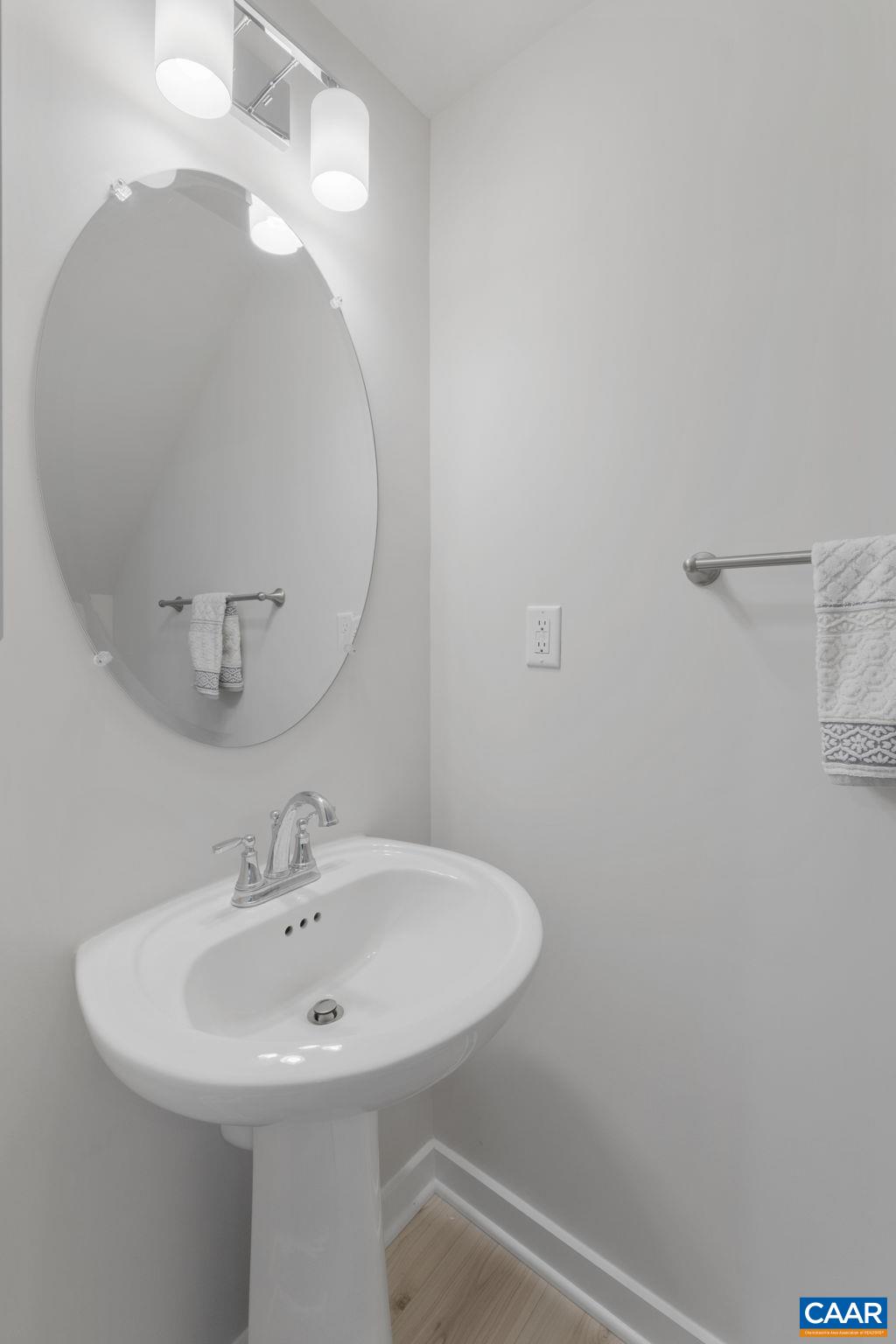 7440 Louisa Road Gordonsville, VA 22942 - Photo 20 of 40 a bathroom with a sink a mirror and vanity