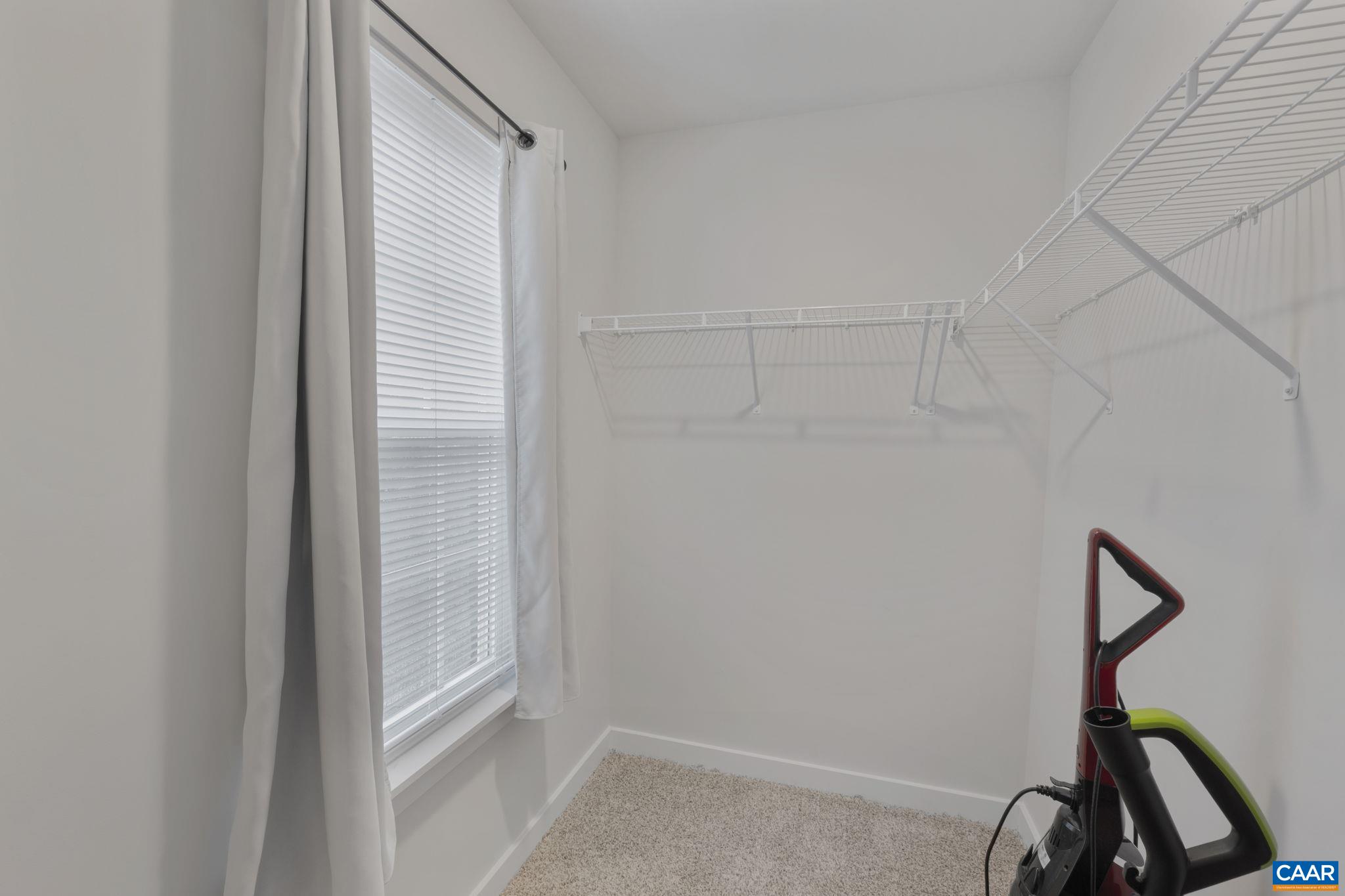 7440 Louisa Road Gordonsville, VA 22942 - Photo 26 of 40 a view of a room with gym equipment