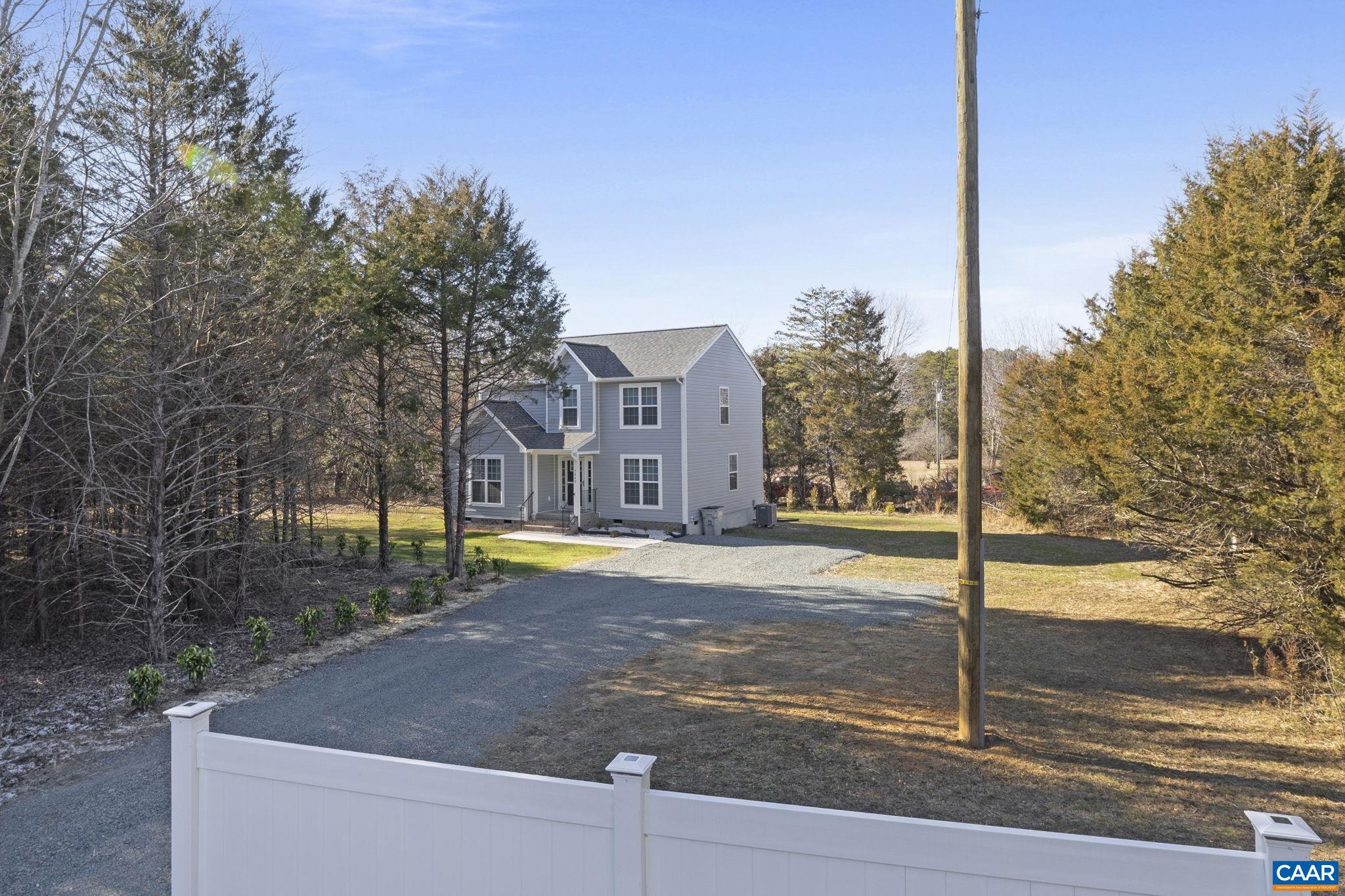 7440 Louisa Road Gordonsville, VA 22942 - Photo 32 of 40 a house view with a yard