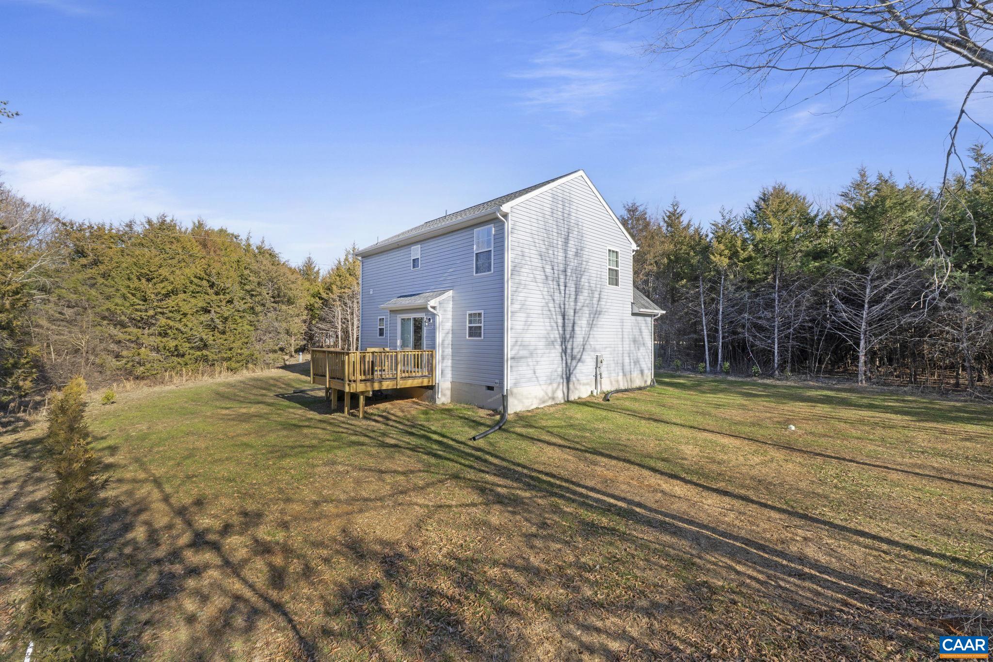 7440 Louisa Road Gordonsville, VA 22942 - Photo 39 of 40 a view of a house with backyard