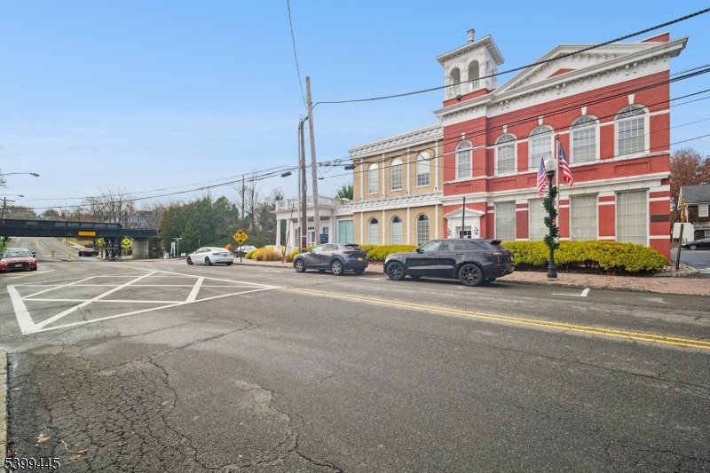 246 Main Street, Unit 304 Chatham, NJ 07928 - Photo 27 of 31 a city street with tall buildings