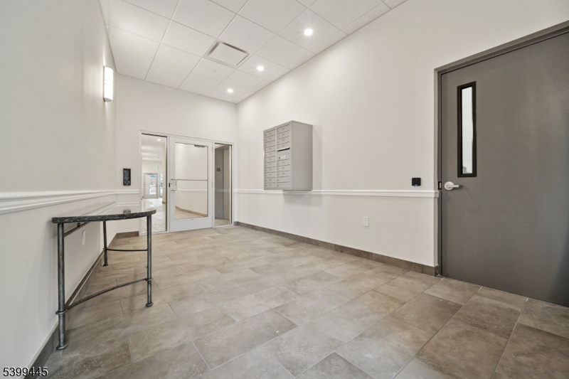 246 Main Street, Unit 304 Chatham, NJ 07928 - Photo 4 of 31 a view of an empty room