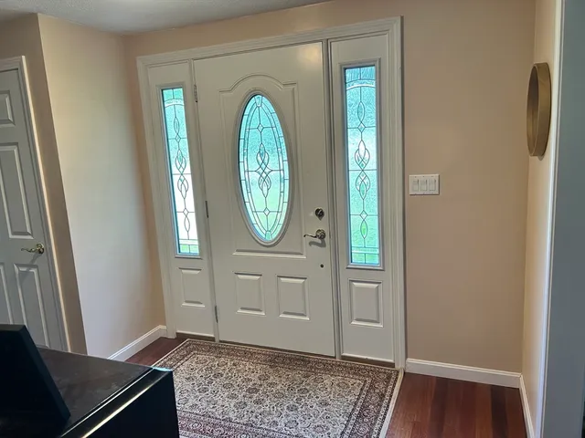 a view of a hallway with windows