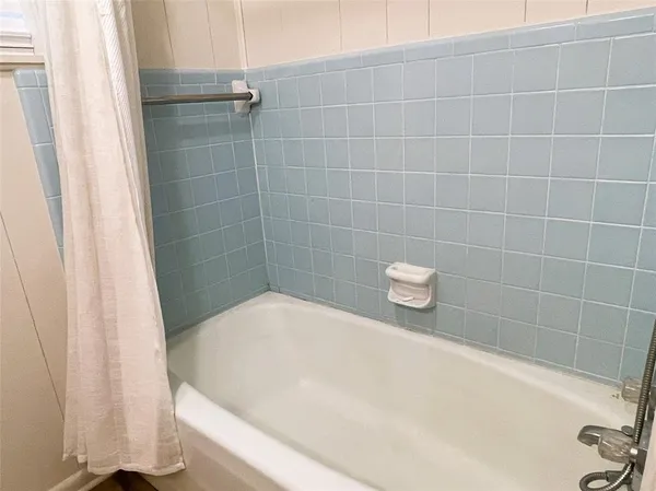 a bathroom with a bathtub