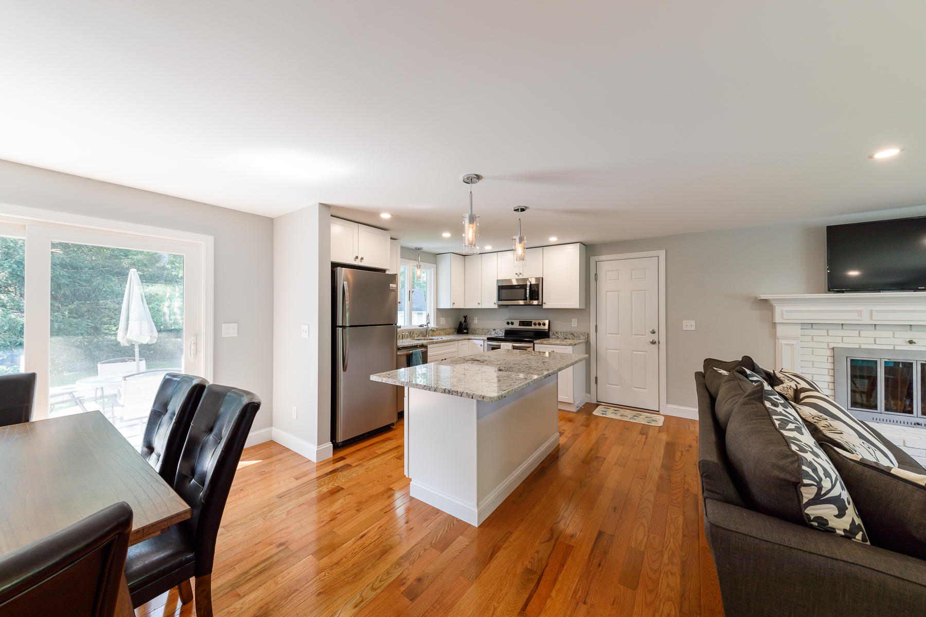 3 Rivers End Road East Falmouth, MA 02536 - Photo 14 of 38 a living room with stainless steel appliances kitchen island granite countertop furniture and a kitchen view